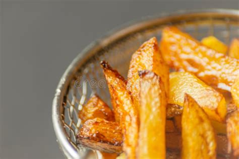 Closeup Of Golden Fries Prepared From Fresh Potatoes, Greasy But Stock ...