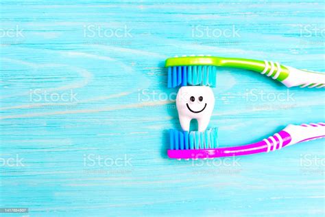 Toothbrushing A Funny Tooth Character Stock Photo Download Image Now