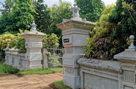 Front Gates Leading To Vintage Colonial Dutch Architecture Style