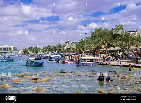 Crowded public beach Aqaba Jordan Stock Photo - Alamy