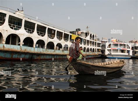 A Man On Small Boat In Buriganga River In Dhaka Stock Photo Alamy