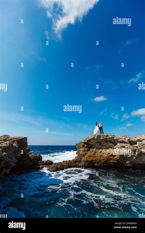 Bride And Groom Near The Ocean Stock Photo Alamy