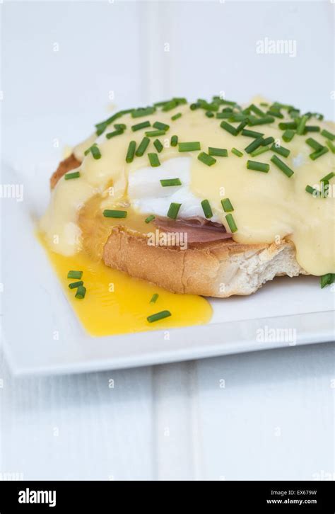 Eggs Benedict Toasted English Muffins Ham Poached Eggs And Delicious Buttery Hollandaise Sauce