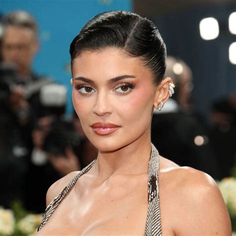 Miley Cyrus Poses Poolside In A Tiny Black Bikini To Announce Her New Single FlowersWe Cant