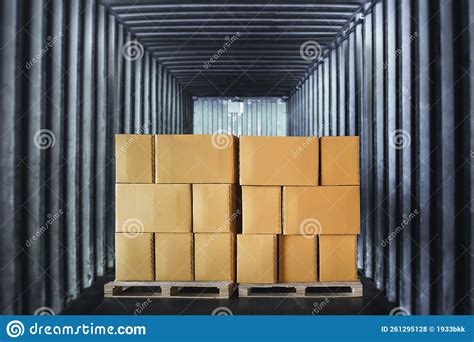 Packaging Boxes Stacked On Pallets Loading Inside Cargo Container