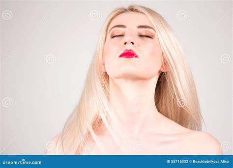 Blonde With Flying Hair Closed Eyes And Make Up Beauty Concept Stock