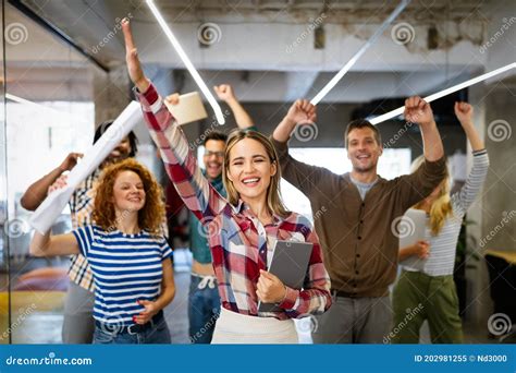 Happy Business People Celebrating Success At Company Stock Image