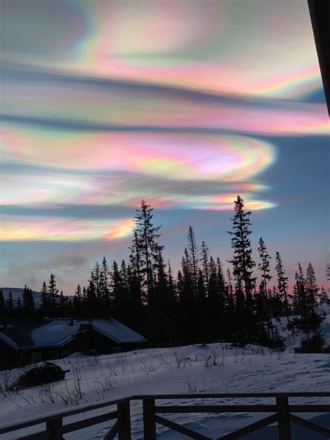 nacreous clouds aesthetic cloud formation  rainbow colors