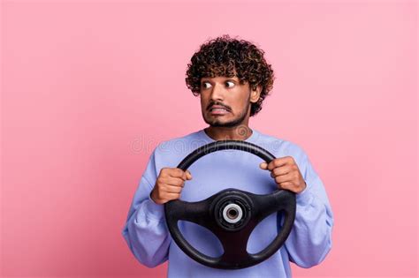 Photo Portrait Of Handsome Young Male Hold Rudder Look Confused Empty