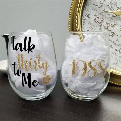 Two Wine Glasses With The Words Talk Thirty To Me On Them