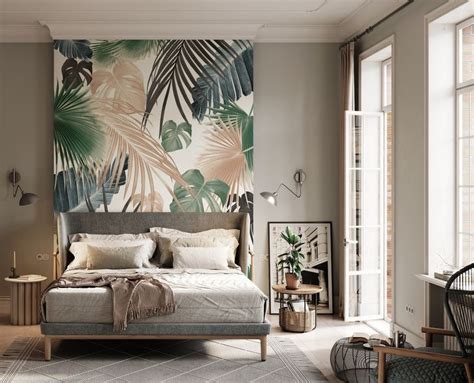 A Bedroom With A Large Bed And Lots Of Plants On The Wall