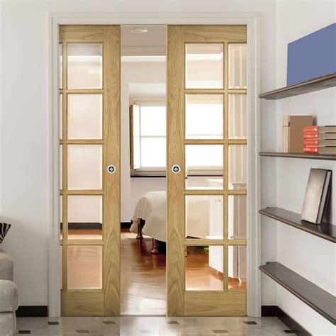 Bristol Oak Double Evokit Pocket Doors - 10 Pane Clear Bevelled Glass