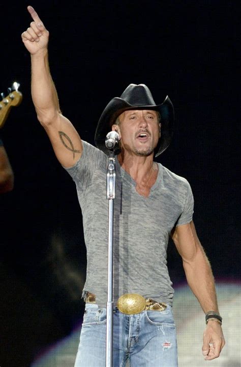 Tim McGraw Has at Least 5 Tattoos Including an Ichthys AKA Jesus Fish — Glimpse at 3 of Them