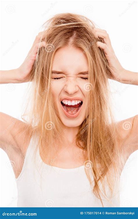 Portrait Of Upset Sad Woman With Damaged Hair Screaming Stock Photo