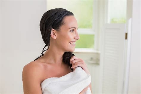 Premium Photo Pretty Brunette Wiping Her Hair