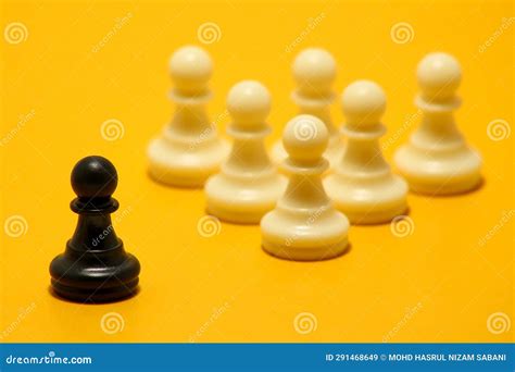 Pawn Versus King In A Chess Game With Shadows Of Chess Pieces In The