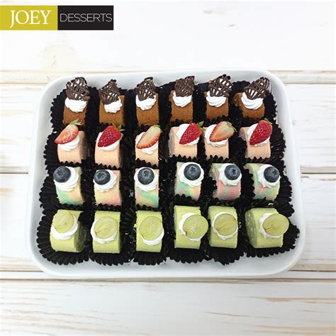 Assorted Mini Swiss Rolls Cakes 24s - The Cake Shop | Singapore Cake ...