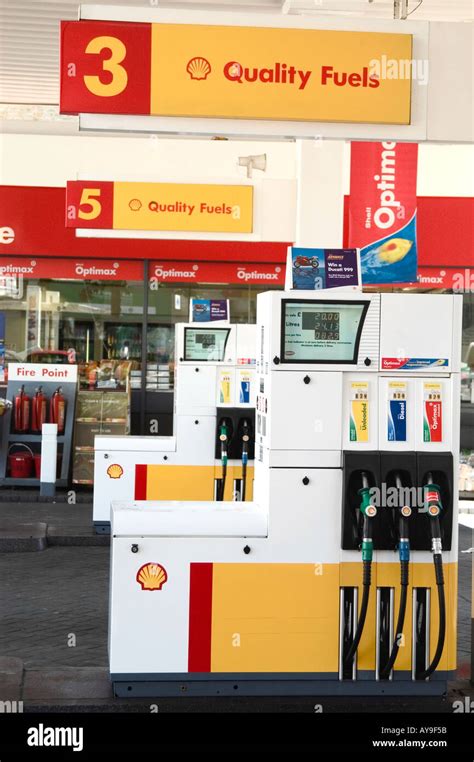 Shell Petrol Pumps At Garage Forecourt Uk Stock Photo Alamy