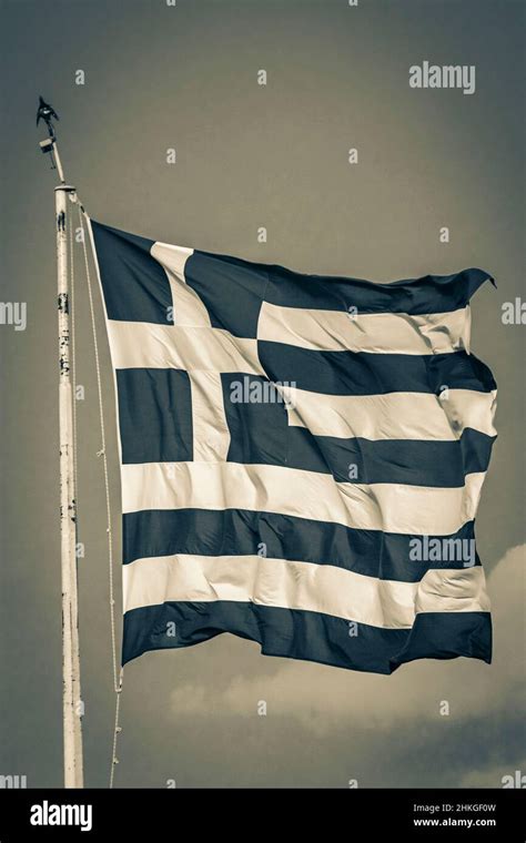 Black and white picture of the Greek blue and white flag with blue sky ...