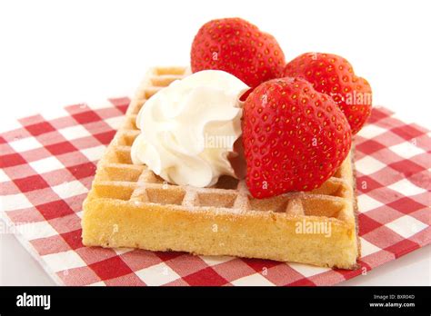 Belgium Traditional Waffle With Strawberries And Whipped Cream Stock