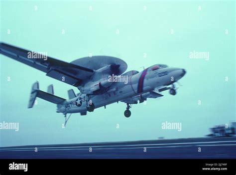 Grumman E2C landing on aircraft carrier Stock Photo - Alamy