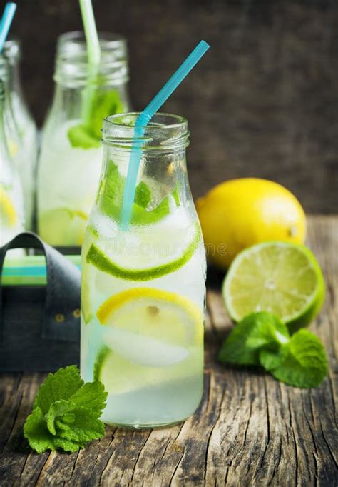 Lemonade In Glass Bottle With Ice And Mint Stock Image Image Of Mint