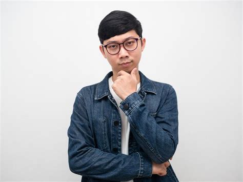 Premium Photo Man Jeans Shirt Wearing Glasses Touch His Chin Confident Face Isolated