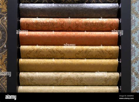 Rolls of vinyl wallpaper for finishing walls. Decorative materials for room, interior, design ...