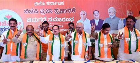 Karnataka Polls Bjp Releases Manifesto Promises Ucc Free Gas Cylinders Milk Packet