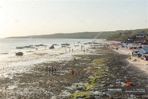 Indonesia, Sulawesi Selatan, Bulukumba, Beach of Bira, walking people ...