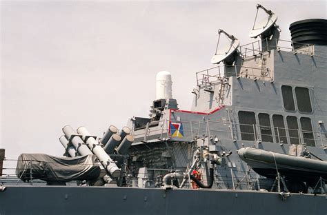 A Starboard View Of Mk Harpoon Launchers And A Mk Phalanx Close