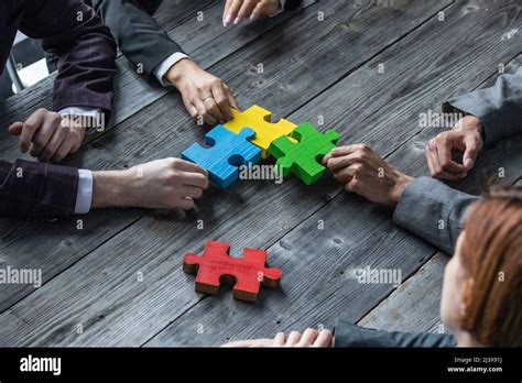 Diverse Team People Assembling Jigsaw Puzzle Multiracial Group Of