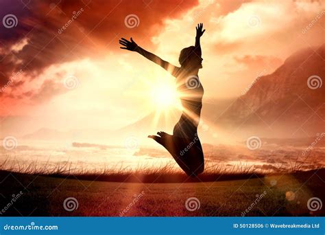 Composite Image Of Gorgeous Fit Blonde Jumping With Arms Out Stock