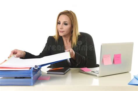 Blond Attractive 40s Woman In Business Suit Working At Laptop Computer