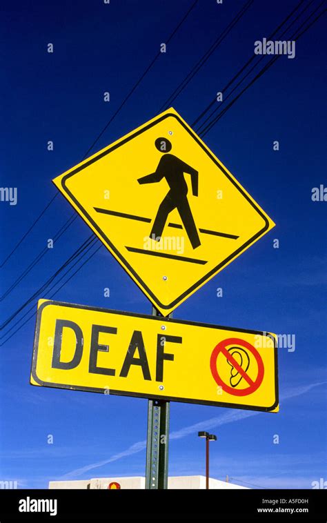 A Traffic Sign Warning Of Deaf People Crossing In Boise Idaho Stock