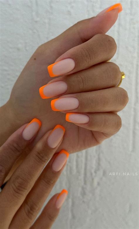 Indulge In The Classic Elegance Of French Nails Orange Neon French Tips