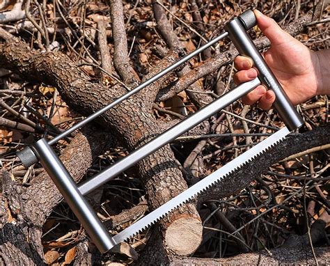 This Bushcraft Bow Saw Folds Up Into Its Own Handles