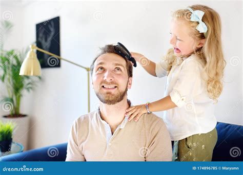 Little Curly Hair Daughter Making Funny Hairstyle for Her Young ...