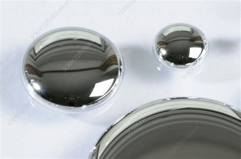 Drops of liquid mercury - Stock Image - C007/6469 - Science Photo Library