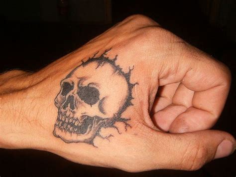 Tattookuro 5 Hand Skull Tattoo The Symbolic Meanings Behind Skull