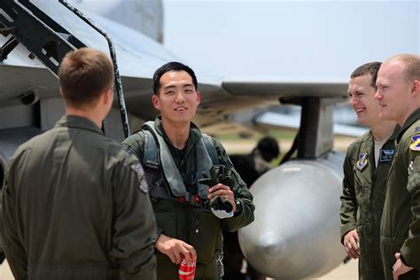 South Korean Air Force Capt Han Min Gyu Center Shares A Laugh With U