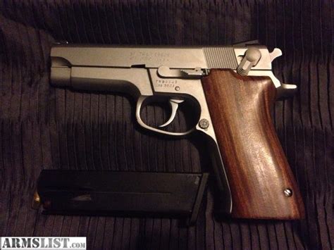 ARMSLIST - For Sale: S&W 5906 9mm w/ hogue wood grips