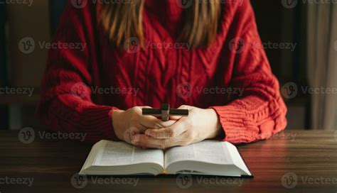 Woman praying on holy bible in the morning.Woman hand with Bible ...