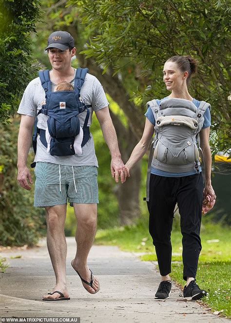 Purple Wiggle Lachlan Gillespie and his fiancée Dana Stephensen hold hands with newborn twins ...