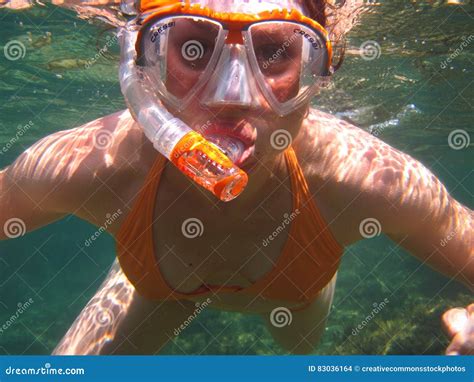 Woman In Orange Bikini Underwater With Snorkel Picture Image 83036164