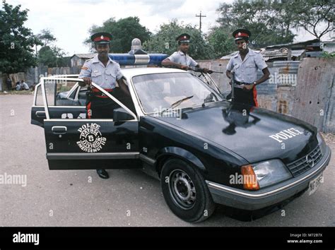 Armed Kingston Police With Patrol Car Jamaica Stock Photo Alamy