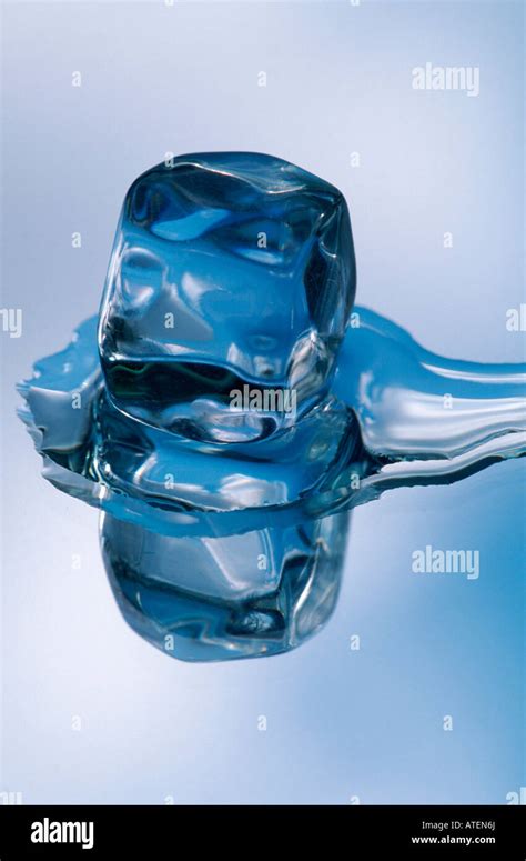 Melting ice cube Stock Photo - Alamy