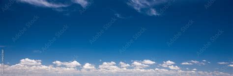 Blue sky with white clouds Stock Photo | Adobe Stock