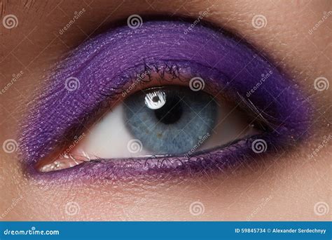 Close Up Of Blue Woman Eye With Beautiful Smoky Make Up Cosmetics