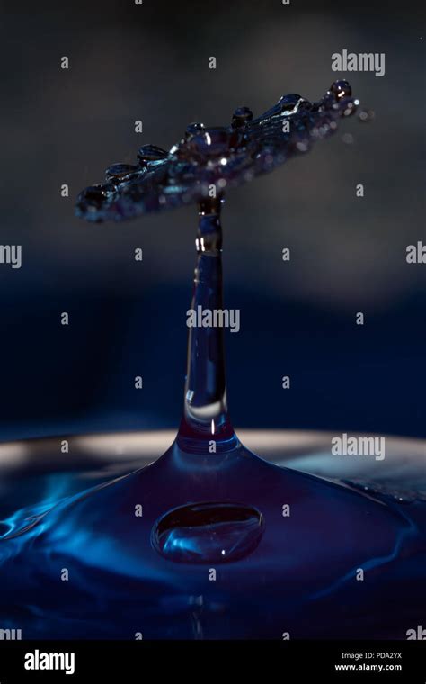 Waterdrop photography creating splash art Stock Photo - Alamy